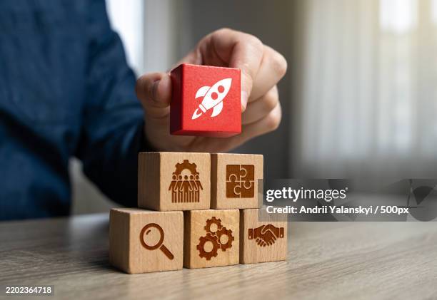 a businessman builds a strategy for a successful business and launching a startup investment funding,growth strategies,business development,and competitive advantage - block removal game stock pictures, royalty-free photos & images