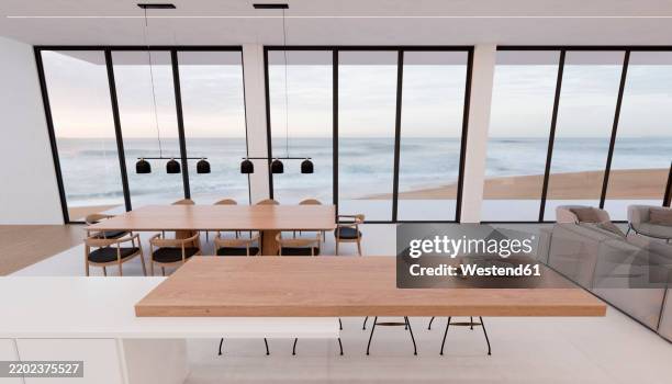 modern beach home interior with ocean view and elegant furnishings - hängelampe stock-grafiken, -clipart, -cartoons und -symbole