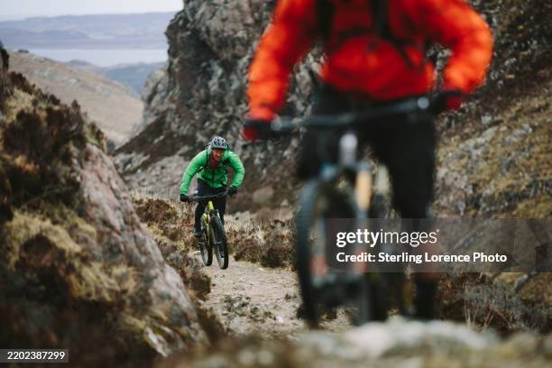 mountain biking in the scottish highlands of northern scotland, united kingdom - adventure stock pictures, royalty-free photos & images