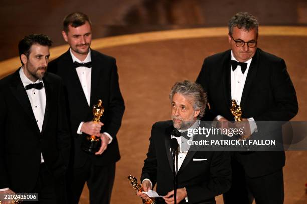 British special effects supervisor Gerd Nefzer, British visual effects supervisor Paul Lambert, British visual effects supervisor Rhys Salcombe and...