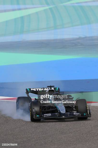 George Russell of Great Britain driving the Mercedes AMG Petronas F1 Team W16 locks a wheel under braking during day three of F1 Testing at Bahrain...