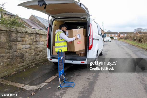 Unload Delivery 1,773 Driver Unloading Stock Photos, High-Res Pictures, and Images ...