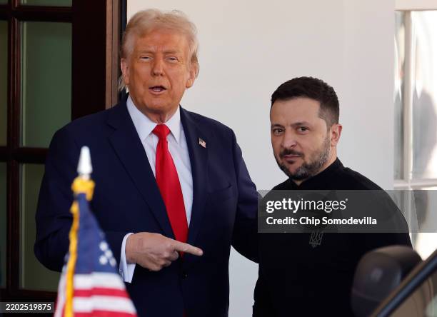 President Donald Trump greets Ukrainian President Volodymyr Zelensky as he arrives at the White House on February 28, 2025 in Washington, DC. Trump...