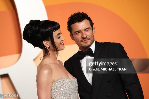US Singer Katy Perry And English Actor Orlando Bloom Attend The News us-singer-katy-perry-and-english-actor-orlando-bloom-attend-the-news