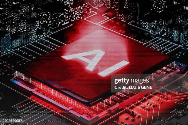 Screen displays an artificial intelligence processor during Keynote 1 at the MWC , the world's biggest mobile fair, in Barcelona on March 3, 2025....