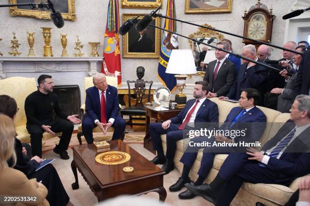 President Donald Trump and Vice President JD Vance meet with Ukrainian President Volodymyr Zelensky in the Oval Office at the White House on February...