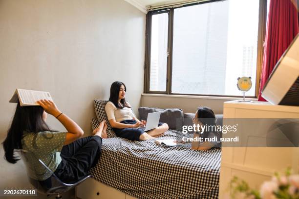 uni students studying together - college dorm stock pictures, royalty-free photos & images