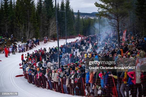 Fans are seen along the track during the Cross-Country Skiing Men's Skiathlon 20km at the FIS World Ski Championships Trondheim at Granasen Skisenter...