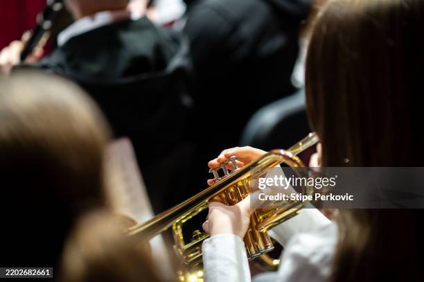 brass harmony: a close-up of a trumpet player - brass stock pictures, royalty-free photos & images
