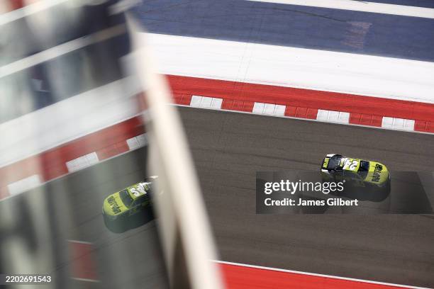 William Byron, driver of the Raptor Chevrolet, drives during qualifying for the NASCAR Cup Series EchoPark Automotive Grand Prix at Circuit of The...