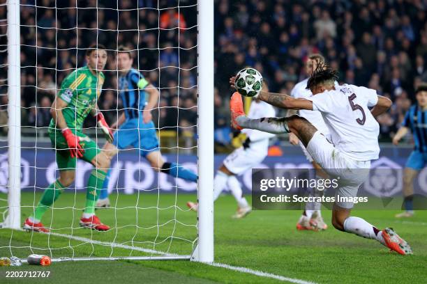 Tyrone Mings of Aston Villa saves on the goal line during the UEFA Champions League match between Club Brugge v Aston Villa at the Jan Breydel...