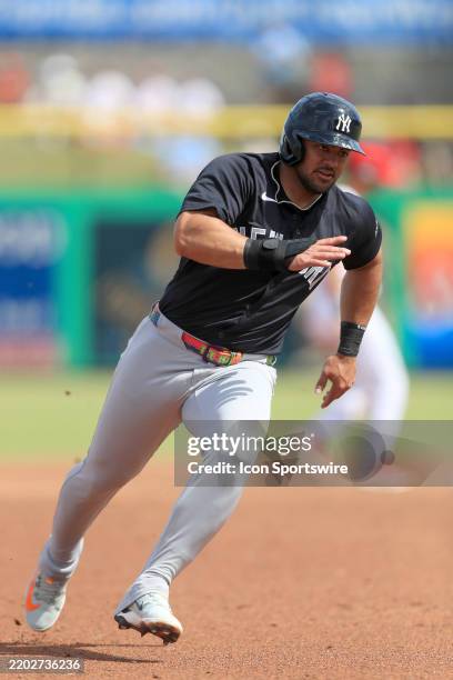 New York Yankees Left Fielder Jasson Dominguez hustles towards third base during the spring training game between the New York Yankees and the...