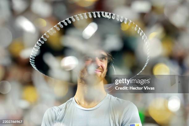 Tomas Machac of the Czech Republic celebrates with the champion trophy after winning the Men's Singles Final match against Alejandro Davidovich...