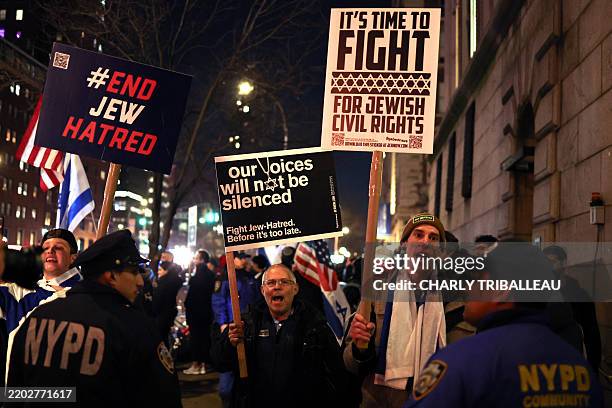 Pro-Jewish protesters gather outside the campus of Columbia University in New York City on March 4, 2025. US President Donald Trump said on March 4...