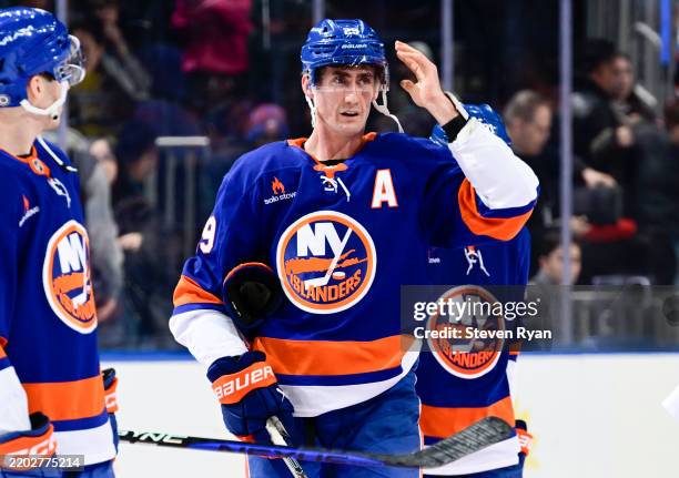 Brock Nelson of the New York Islanders waves to fans after the team's 3-2 win against the Winnipeg Jets at UBS Arena on March 04, 2025 in Elmont, New...