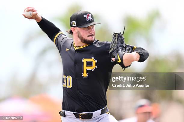 Paul Skenes of the Pittsburgh Pirates delivers a pitch in the first inning against the Baltimore Orioles during a Grapefruit League spring training...