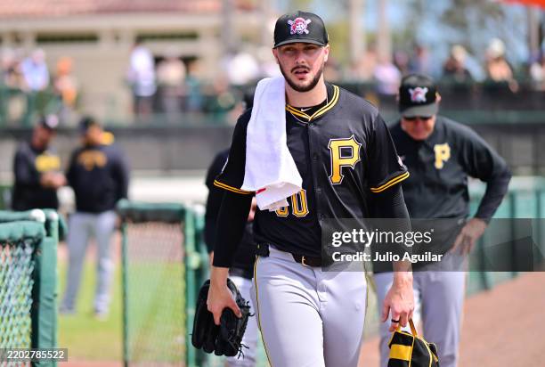 Paul Skenes of the Pittsburgh Pirates walks to the dugout prior to a Grapefruit League spring training game at bat at Ed Smith Stadium on March 01,...