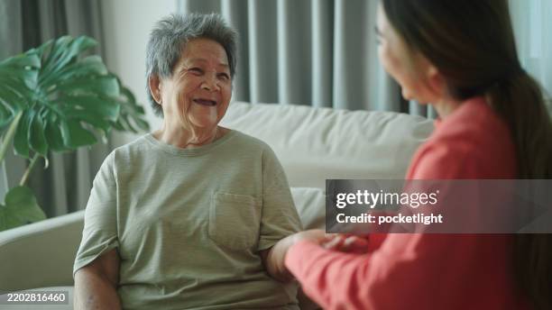 elderly relax massage. - systemic lupus erythematosus stock pictures, royalty-free photos & images