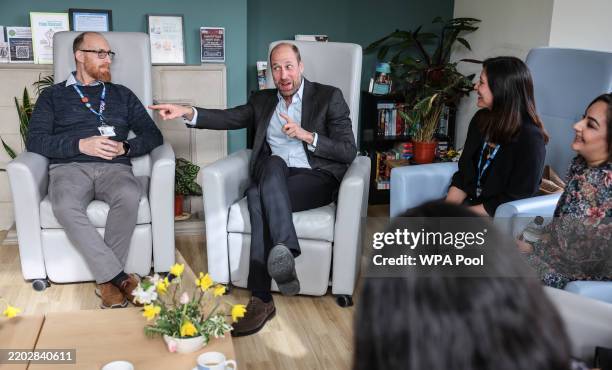 Prince William, Prince of Wales talks to NHS staff members as he visits the Royal Berkshire Hospital on March 5, 2025 in Reading, England. The visit...