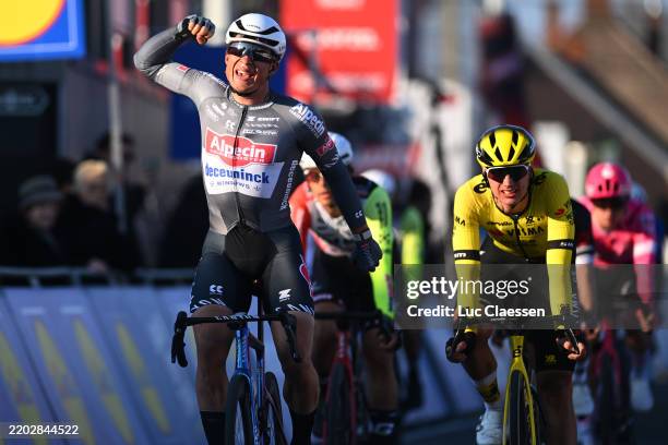 Jasper Philipsen of Belgium and Team Alpecin-Deceuninck celebrates at finish line as race winner during the 77th Kuurne - Bruxelles - Kuurne 2025 a...