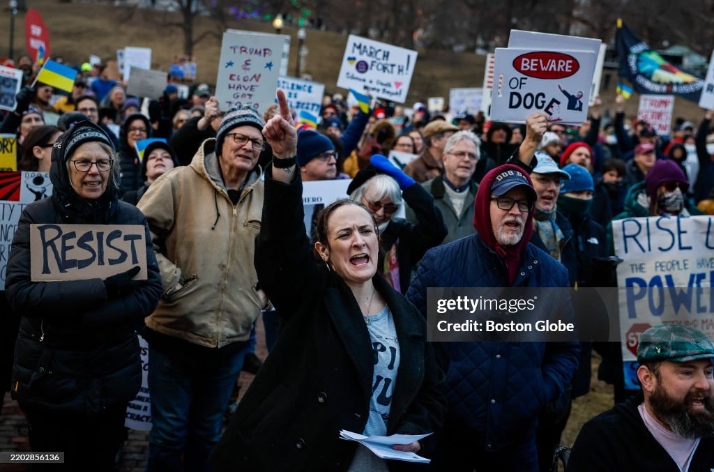 Protesters rally on Boston Common to denounce Trump ahead of address to Congress