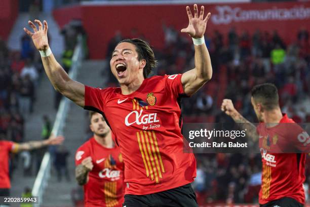 Takuma Asano of RCD Mallorca celebrates scoring his team's first goal during the LaLiga match between RCD Mallorca and Deportivo Alaves at Estadi de...