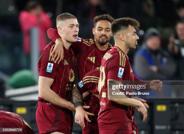 Artem Dovbyk of AS Roma celebrates scoring his team's second goal during the Serie A match between AS Roma and Como at Stadio Olimpico on March 02,...