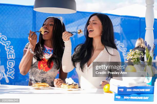 Serena Page and Leah Kateb attend as IHOP hosts its "20K for Pancake Day" event at the Santa Monica Pier and broke the GUINNESS WORLD RECORDS™ title...