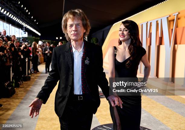 Mick Jagger and Melanie Hamrick attend the 2025 Vanity Fair Oscar Party Hosted By Radhika Jones at Wallis Annenberg Center for the Performing Arts on...