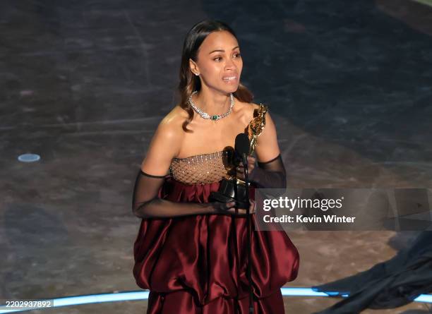 Zoe Saldana accepts the Best Actress In A Supporting Role award for "Emilia Pérez" onstage during the 97th Annual Oscars at Dolby Theatre on March...