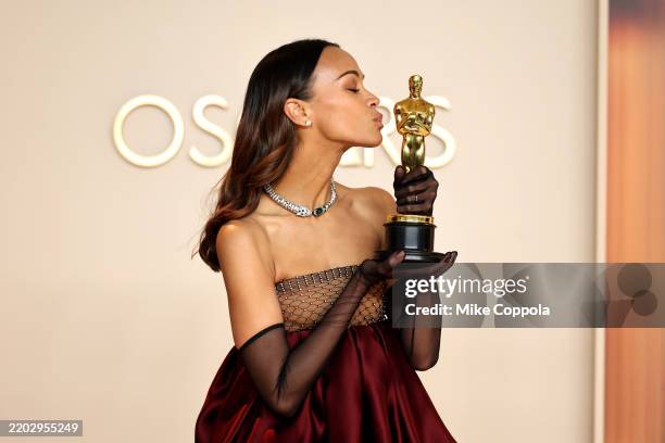Zoe Saldaña, winner of the Best Actress in a Supporting Role for “Emilia Pérez”, poses in the press room during the 97th Annual Oscars at Ovation...