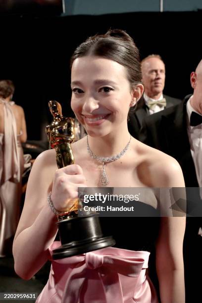 In this handout photo provided by The Academy, Mikey Madison poses backstage during the 97th Annual Oscars at Dolby Theatre on March 02, 2025 in...