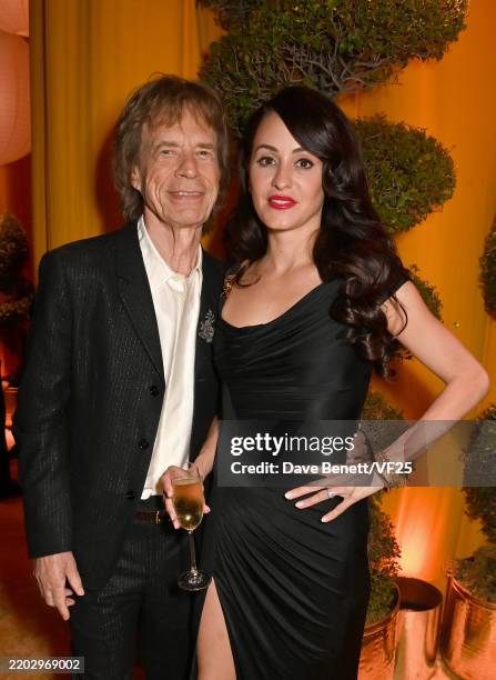 Mick Jagger and Melanie Hamrick attend the 2025 Vanity Fair Oscar Party Hosted By Radhika Jones at Wallis Annenberg Center for the Performing Arts on...