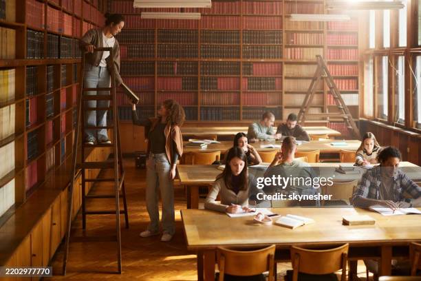 here is the book you have asked for! - public library stock pictures, royalty-free photos & images