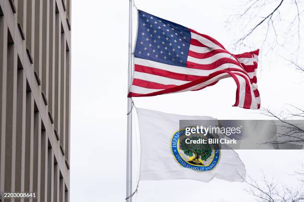 Flags fly outside of the Lyndon Baines Johnson Department of Education Building in Washington on Thursday, March 6, 2025.