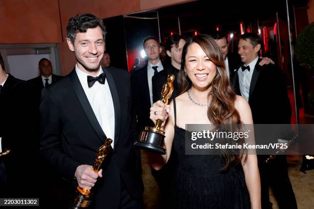 Alex Coco and Samantha Quan attend the 2025 Vanity Fair Oscar Party Hosted By Radhika Jones at Wallis Annenberg Center for the Performing Arts on...