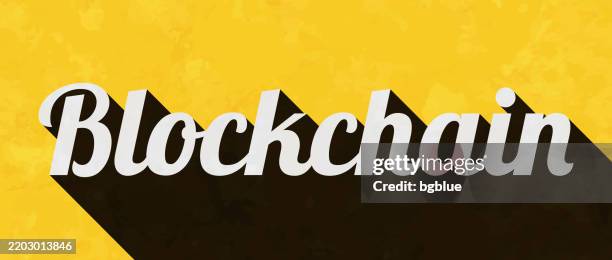 Blockchain Text With Long Shadow On Textured Yellow Background High-Res ...