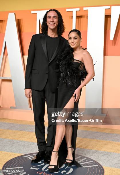 Cole Tucker and Vanessa Hudgens attend the 2025 Vanity Fair Oscar Party Hosted By Radhika Jones at Wallis Annenberg Center for the Performing Arts on...