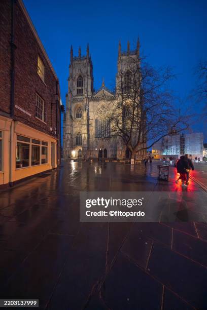 twilight reflections and gothic architecture in york - minster stock pictures, royalty-free photos & images