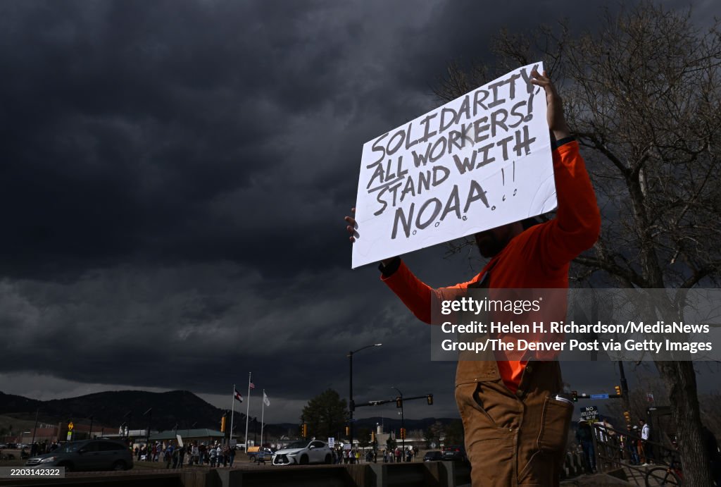 Hundreds protest cuts to federal programs in Boulder