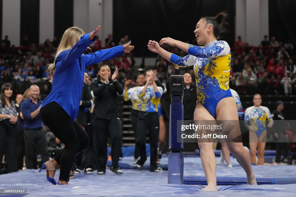 Emily Raber Ucla Emily Lee of the UCLA Bruins reacts after performing on the balance ...