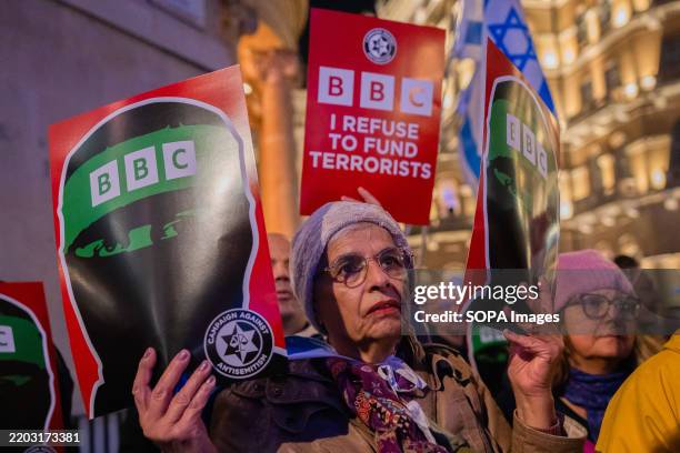 Pro-Israeli protestors hold placards during the demonstration. Jewish activist group Campaign Against Antisemitism organized a demonstration against...