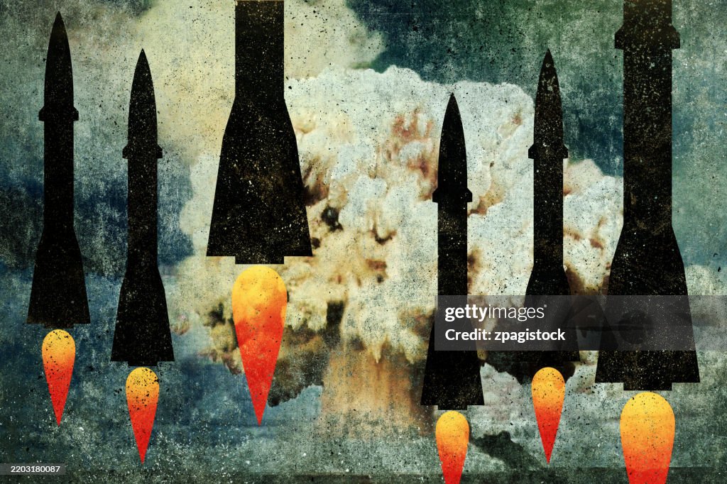 Nuclear Threat: Silhouetted Missiles Against Atomic Explosion