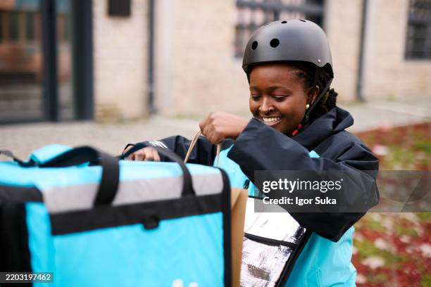 African Delivery Rider 124 African Delivery Motorbike Stock Photos, High-Res Pictures, and ...