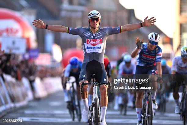 Mathieu van der Poel of Netherlands and Team Alpecin - Deceuninck celebrates at finish line as race winner ahead of Paul Magnier of France and Team...