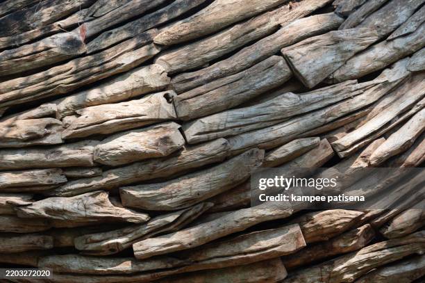 a wooden surface with a grain pattern - chipboard paper stock pictures, royalty-free photos & images