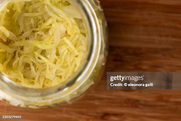 fermented sauerkraut - sauerkraut stock pictures, royalty-free photos & images