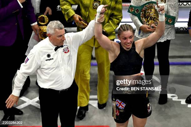 Wales' Lauren Price celebrates beating England's Natasha Jonas during the WBC, IBF, WBA world welterweight unification fight at the Royal Albert Hall...