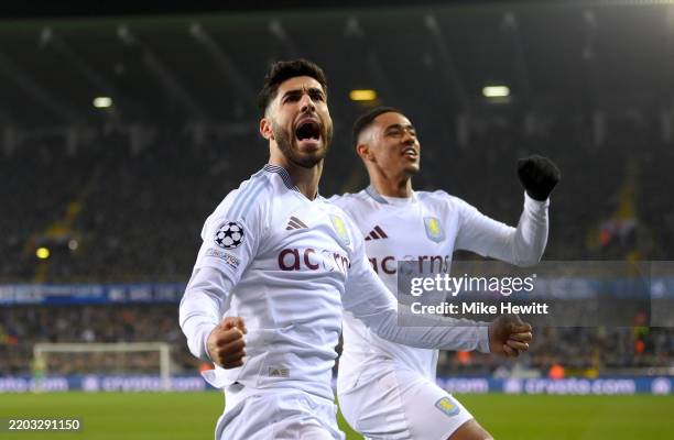 Marco Asensio of Aston Villa celebrates scoring his team's third goal with teammate Jacob Ramsey during the UEFA Champions League 2024/25 Round of 16...
