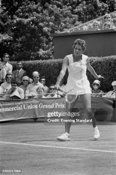 Australian tennis player Evonne Goolagong competing against Olga Morozova of the Soviet Union in the women's singles final at the Queen's Club...